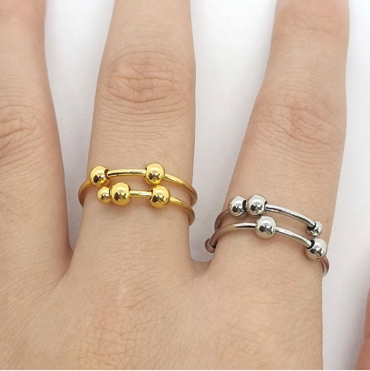 Anillos antiestrés acero inoxidable bañado en oro de 18k 